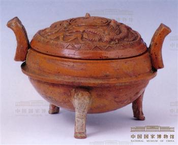 黄褐色龙虎纹陶鼎